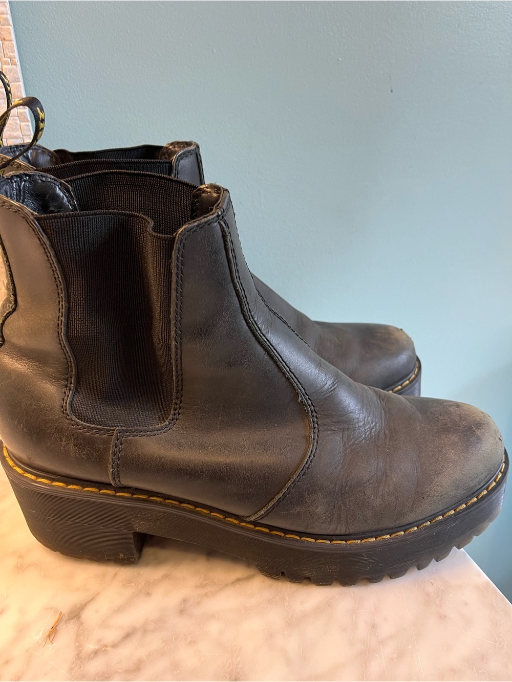 Dr. Martens Black Leather Platform Chelsea Booties with Yellow Welt Stitching